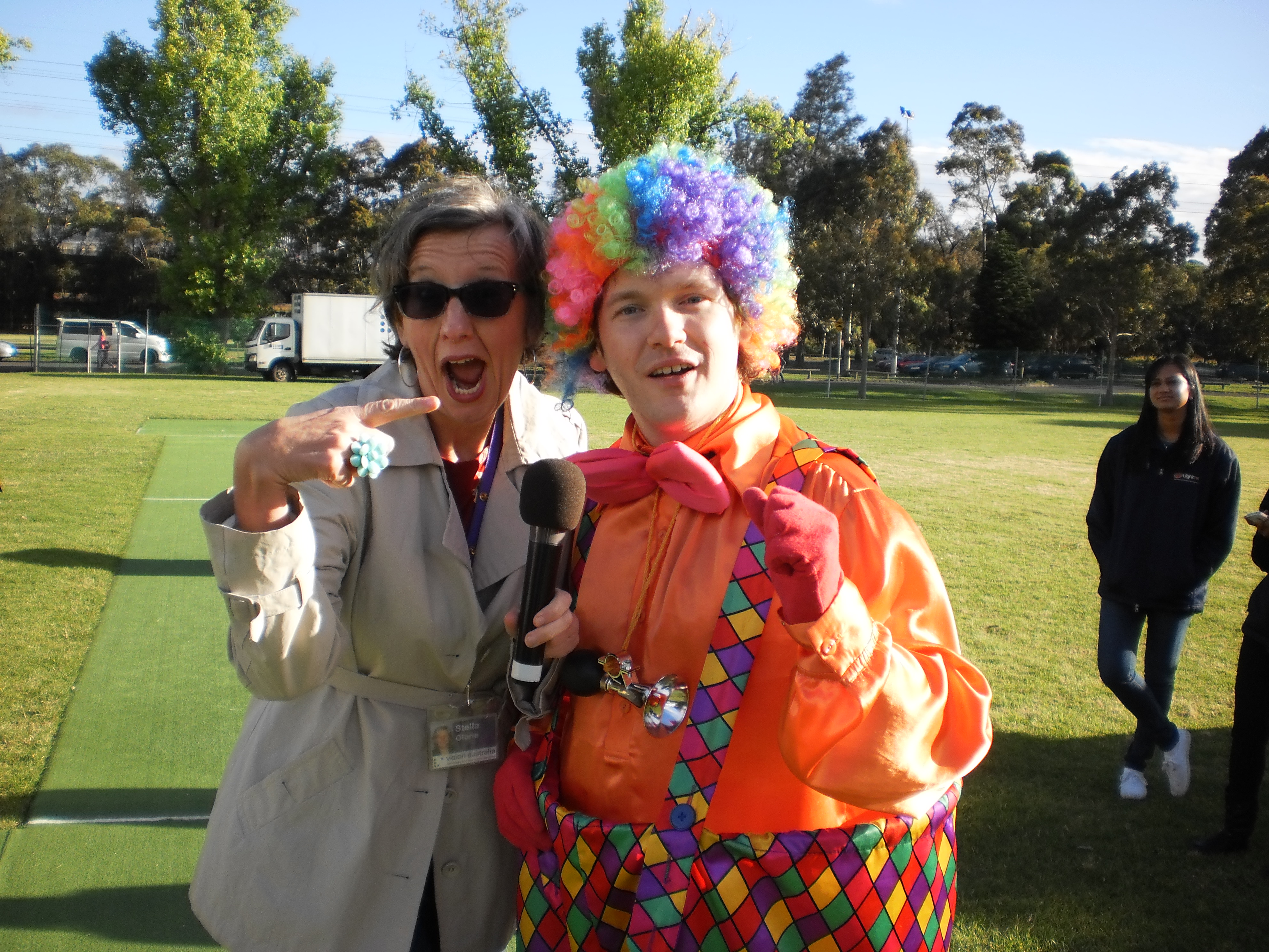 Stella Glorie from Vision Australia Radio with a clown.