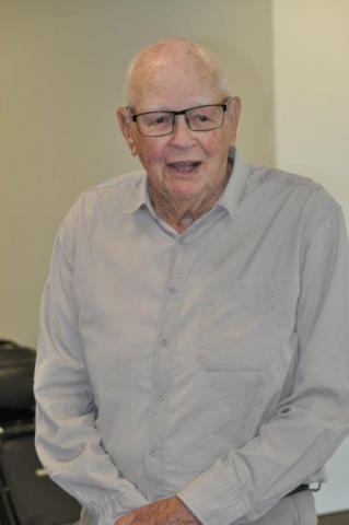 Retiring volunteer Graham Sinclair giving a speech at Vision Australia Radio in Perth