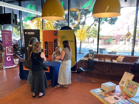 Vision Australia Radio signage sits along other sponsor banners at the Sunshine library where the events took place.