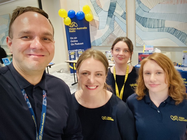 Jason (Vision Australia Radio) takes a selfie with members of the Vision Store Coorparoo team, Eliza, Ruby and Kayla