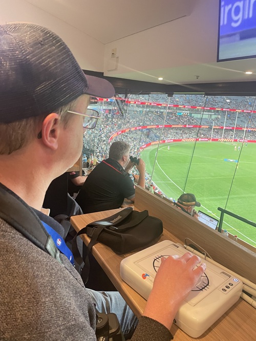 Matt lee watched on from a media box at the MCG, suppprted by use of AFL Touch and Track. 