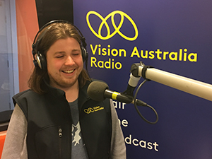 Talking Vision host Sam Colley in the studio