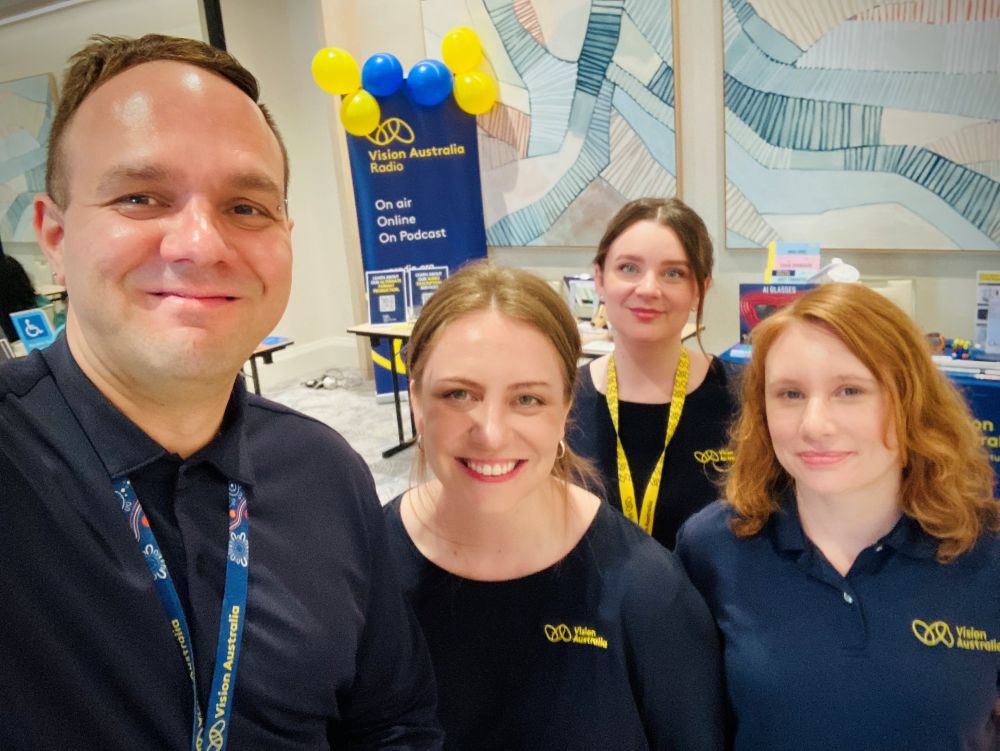 Vision Australia Radio and Vision Store staff take a selfie at 2025 event.