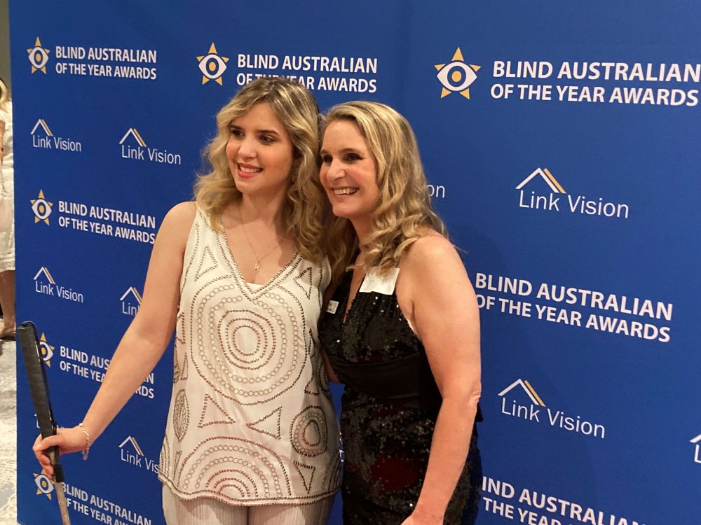 Photo of Rachel Leahcar and Reggie Bird at 2025 Blind Australian of the year awards.